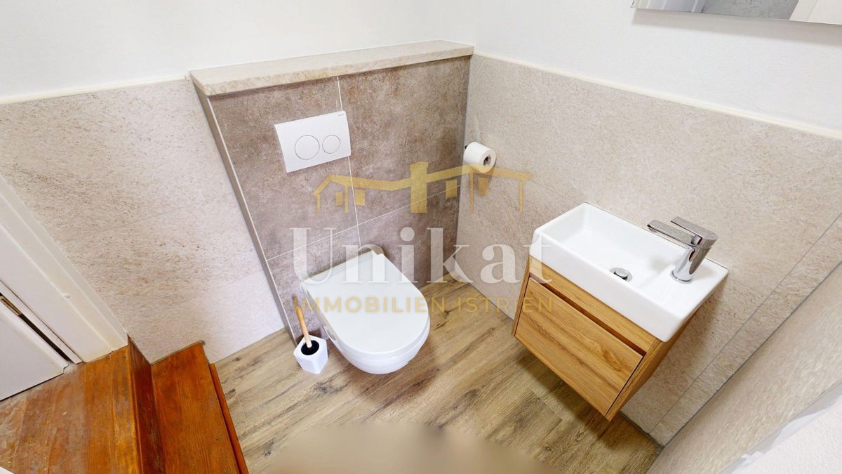 Dvojna hiša z garažo in velikim vrtom